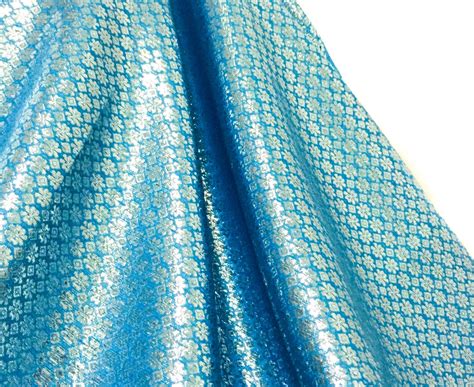 light blue metallic fabric|fabric with metallic accents.